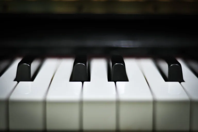 Close-up of piano keys in warm light